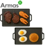 Cast iron grill grate 46×23 cm with steaks and salmon slices on the ribbed side