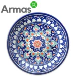 Uzbeku keramikas šķīvis ar ziedu rakstu un oranžiem akcentiem