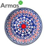 Uzbeku šķīvis ar ziedu rakstu uz tumši zila fona