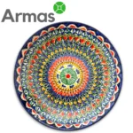 Uzbek plate with colorful floral mandala on a dark blue background