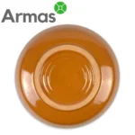 Aizmugures skats uz glazētu oranžu Uzbeku šķīvi – keramika