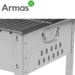 Side view of the Mangals grill at the campsite