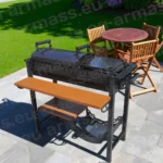 Садовый гриль с крышкой и полками на террасе