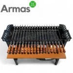 Вид сверху – гриль с шампурами и полкой для дров.